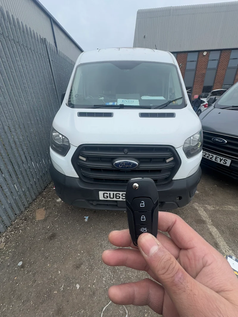Ford Transit van parked at a residential driveway in East London during on-site FDRS key programming and module diagnostics
